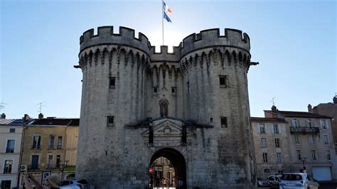 an old stone castle with a flag on top