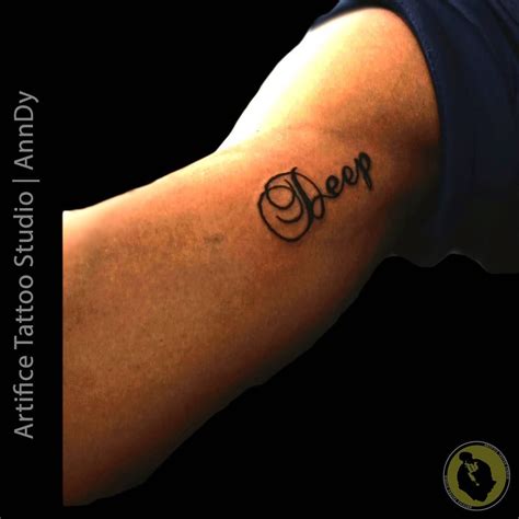 Name tattoo on biceps Call 7003642788 for a FREE APPOINTMENT. . done at ...