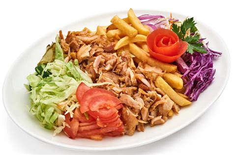 Doner Kebab On A Plate With French Fries And Salad Stock Photo ...