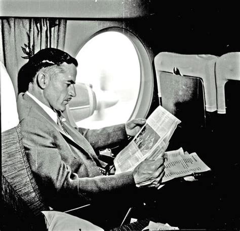 SAA Vickers Viscount interior. Passenger reading. Note big oval window ...