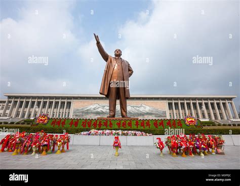 Flowers in front of Kim il Sung statue in Mansudae Grand monument ...