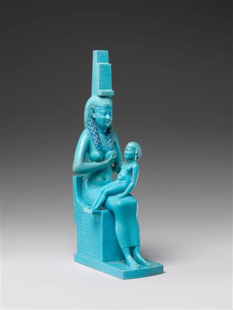 Ancient Egyptian statue of goddess Isis breastfeeds her son Horus made ...