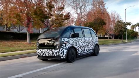 Jay Leno checks out the first model from EV startup Canoo