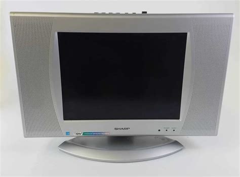 Sharp early 2000’s flat screen TV-13” - Hangar 19 Prop Rentals