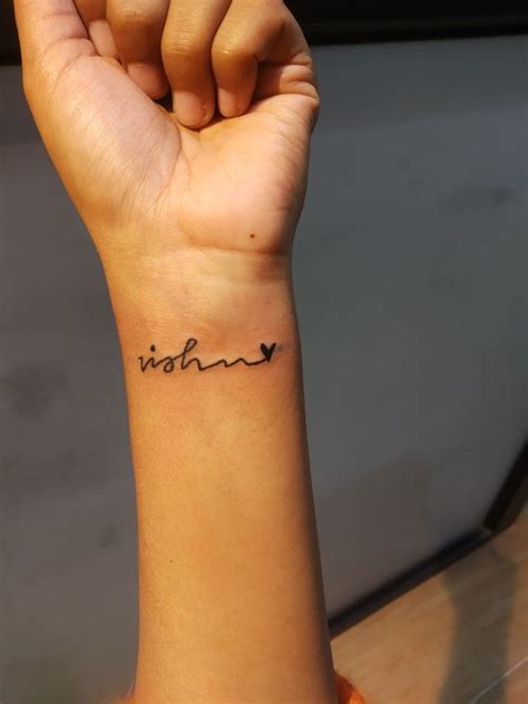 Small name tattoo on wrist | Name tattoos on wrist, Name tattoo on hand ...