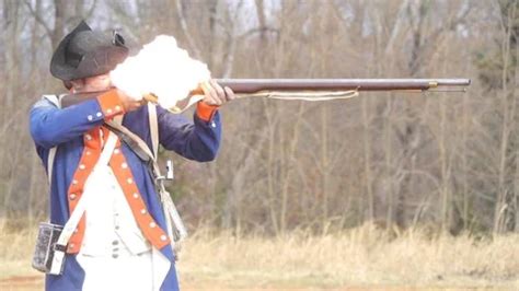 Patriot Soldier firing flintlock musket | Stock Video | Pond5