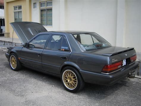 Nissan Bluebird U12 - reviews, prices, ratings with various photos