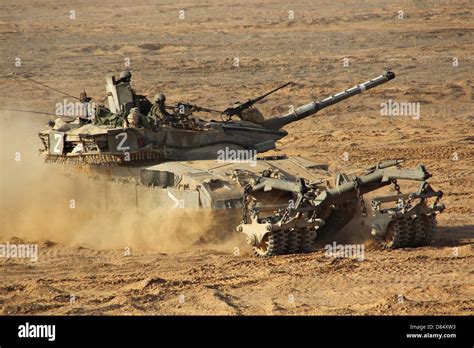 An Israel Defense Force Merkava Mark II battle tank with mine clearing ...