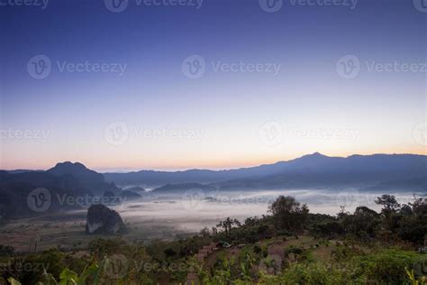 Sunrise above foggy mountains 2009604 Stock Photo at Vecteezy