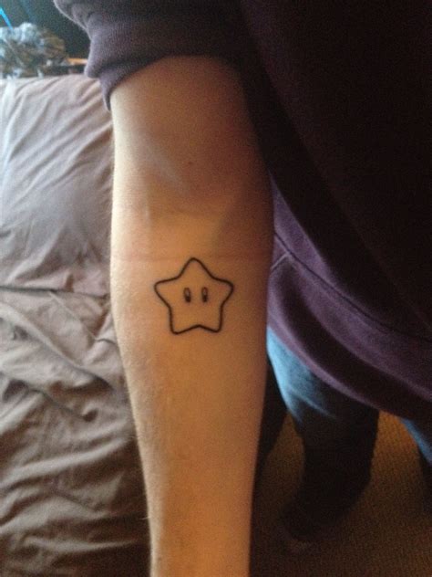 My Mario Star Tattoo on my lower arm