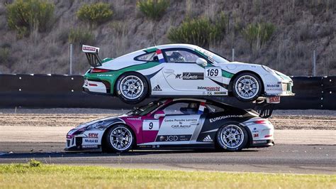 Porsche 911 GT3 racecar ends on top of another 911 GT3 at Carrera Cup ...