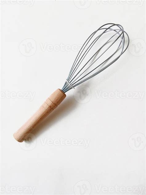 hand whisk for kitchen with wooden handle on white background 13481476 ...