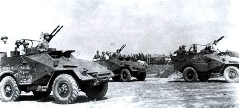 A squad of BTR-40 APC armed with ZPTU-2 14.5 mm gun, being used by the ...