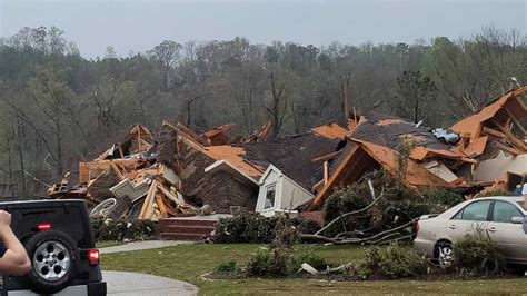 Alabama tornado outbreak: Photos show damaged homes, large hail