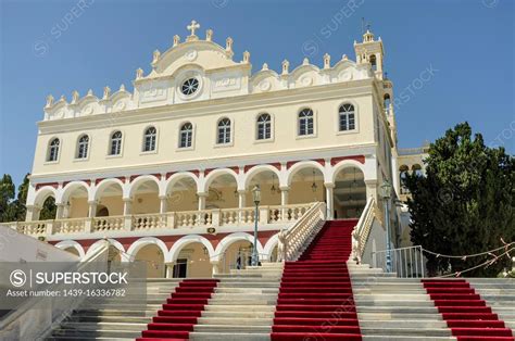 View of Our Lady of Tinos Church with red carpet on stairs, Tinos ...