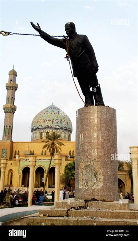 Iraq War 2003 Iraqi President Saddam Hussein s statue in Baghdad s al ...