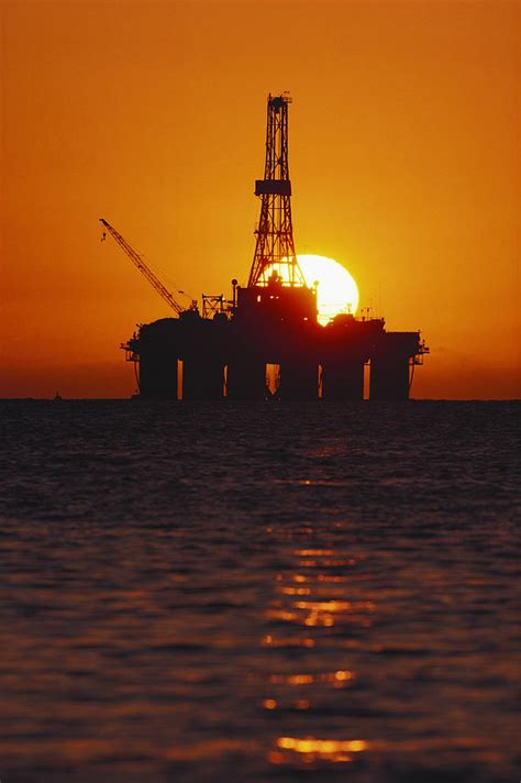 Offshore Oil Rig At Sunset Photograph by Phillip Hayson - Fine Art America