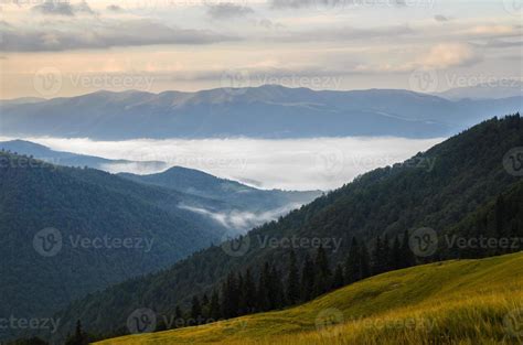 Sunrise foggy mountains 1322904 Stock Photo at Vecteezy