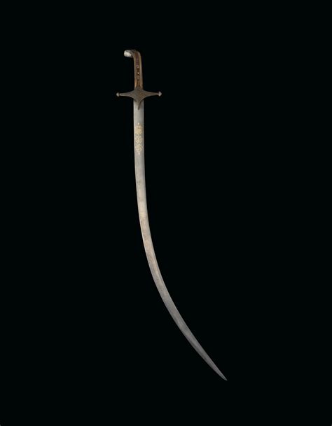 A FINE WATERED-STEEL CURVED SWORD (SHAMSHIR) , SIGNED 'ALI ASGHAR ...