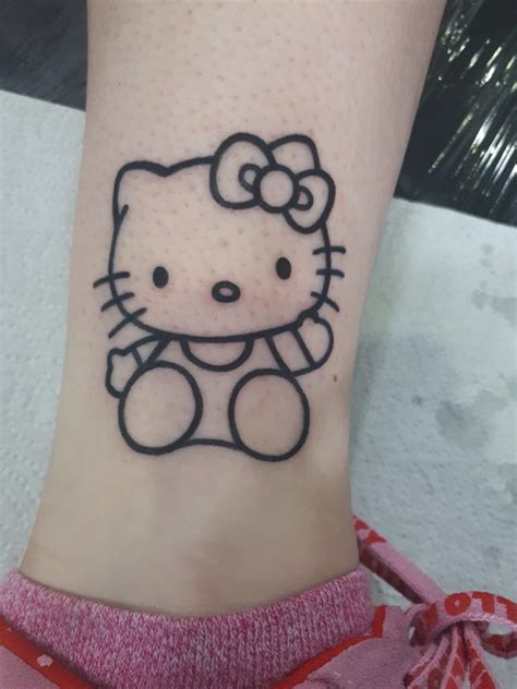 So happy with my beautiful hello kitty tattoo. Came out even better ...