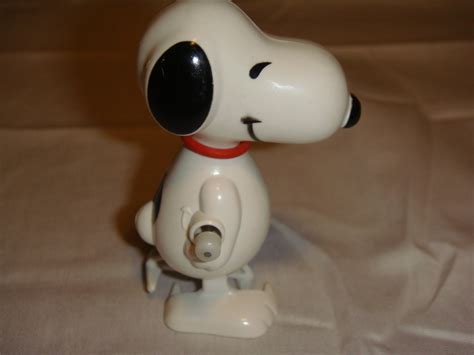 Items similar to Vintage 1958 Snoopy Wind Up Toy on Etsy