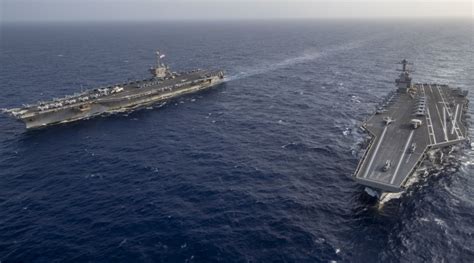 These photos of USS Gerald R. Ford and USS Harry S. Truman operating ...