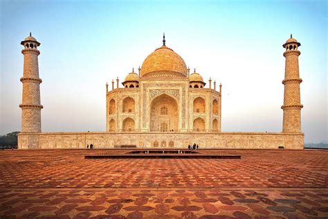 Sunrise at the Taj Mahal Photograph by Jean Fogelberg