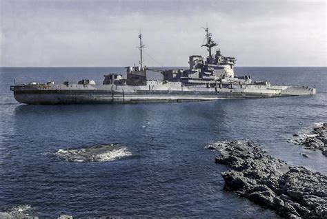 Decommissioned HMS Warspite after losing her tow in a storm, 1947 ...