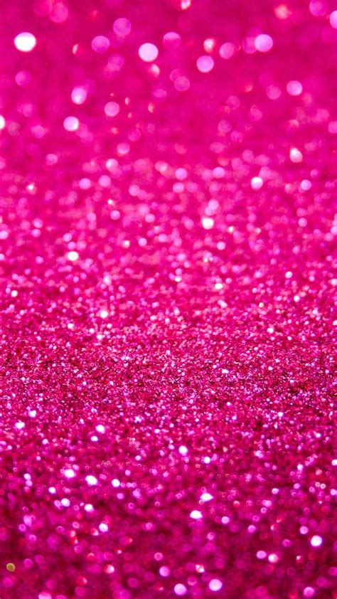 bright pink glitter background with lots of small dots on it's surface ...