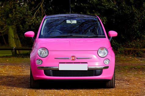 Photo of Pink Fiat 500 Car – GoldPoster Free Stock Photos