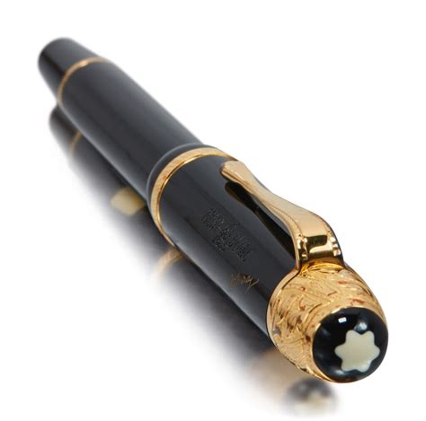 MONTBLANC | A LIMITED EDITION GOLD PLATED AND BLACK RESIN FOUNTAIN PEN ...