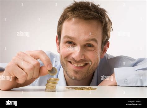 Man Counting Coins Stock Photo - Alamy