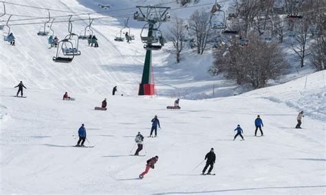 People practice skiing at Mount Hermon ski resort in Golan Heights ...