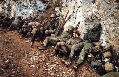 Exhausted Chinese soldiers take a rest during the Sino-Vietnamese War ...