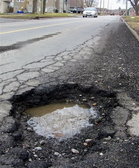 What causes potholes? - Sand Seal Paving