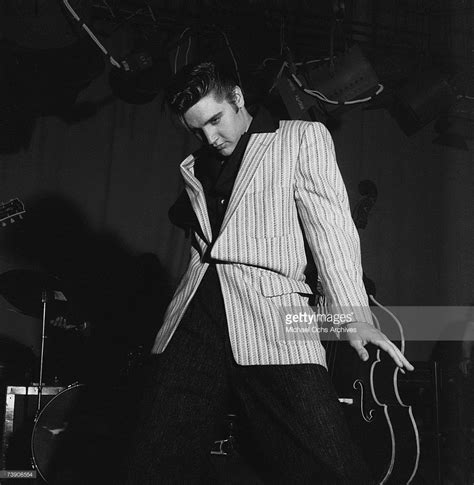 Rock and roll musician Elvis Presley performing on the Milton Berle ...