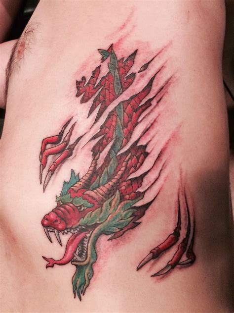 Dragon Tattoos Ripping Out Of Skin