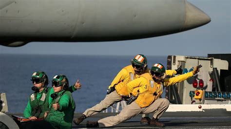 PsBattle: Flight deck crew signalling to launch : r/photoshopbattles