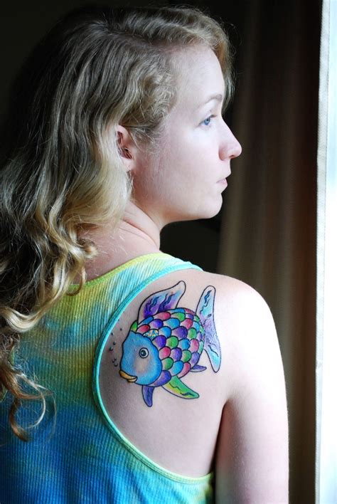 I love the shiny scale... "This is my Rainbow Fish tattoo inspired by ...