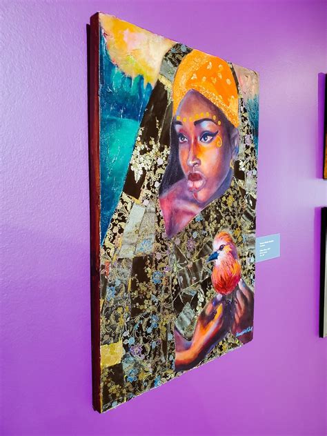 a painting on a purple wall in a room