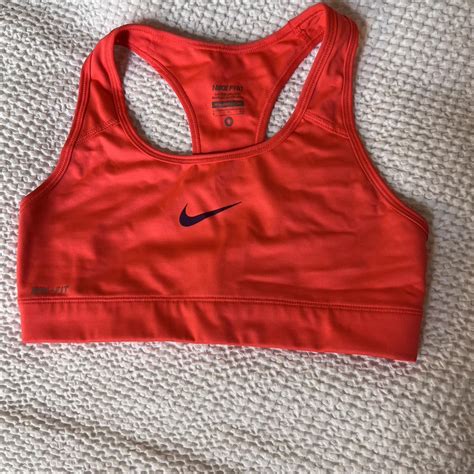 Nike race back sports bra - much more of a coral... - Depop