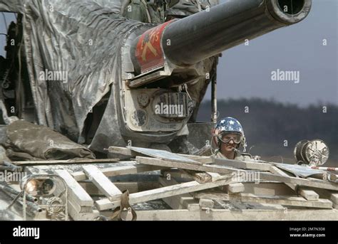 The driver maneuvers an M110 203 mm self-propelled howitzer during a ...