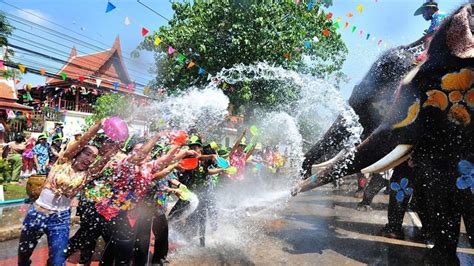 Traditional costumes, elephants highlight Thailand's Songkran Festival ...