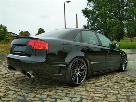 Black Audi A4 B7 on Cobblestone Road