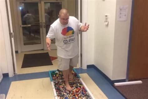 Man breaks Guinness record by walking across 120 feet of Lego bricks ...