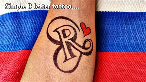 Details more than 82 r letter tattoo on hand super hot - in.cdgdbentre