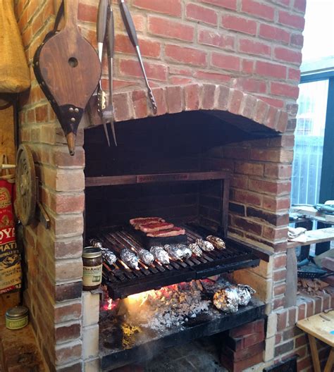 Gaucho Grills Insert in a fireplace installation. A Beautiful wood ...