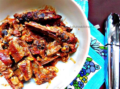 Nyama choma goes really well with ugali and adding some tomatoe sauce ...