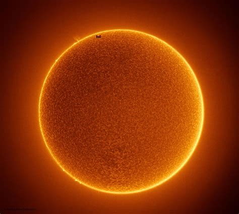 Incredible Photo of the ISS Transiting the Sun Featured by NASA