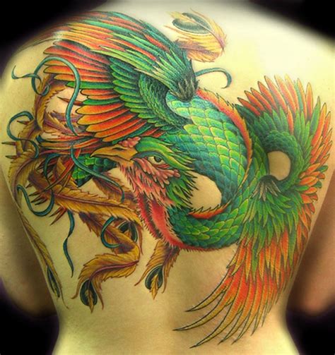 Green phoenix tattoo on whole back - Tattooimages.biz